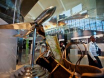 Los Angeles International Airport previews the new Tom Bradley International Terminal on Thursday for the media. The 150,000 square-foot Great Hall includes 60 new luxury retail shops and gourmet dining.