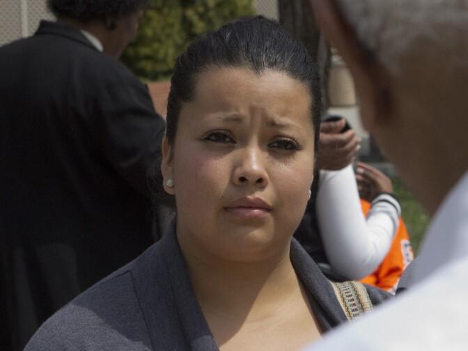 Student Victoria Villalpando listens to the recruitment pitch from a University of Arkansas at Pine Bluff representative.