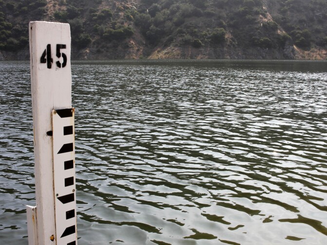 Markers indicate the current water level at the Morris Dam in Los Angeles County, California on June 7, 2017.