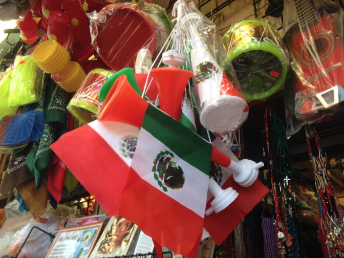 Mexican-flag plastic trumpets on display at a gift shop in El Mercadito. Soccer fans have been buying them to take to the U.S.-Mexico game Saturday at the Rose Bowl.