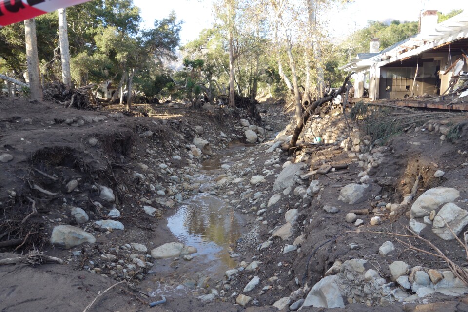 Montecito Creek just north of East Valley Road (aka Route 192) overflowed its banks. The mud rose so high it left a mark five feet high on the white house on the creek's edge. The debris tore through that home's garage and some front rooms. Downstream, the same debris flow ruined several more nearby homes.
