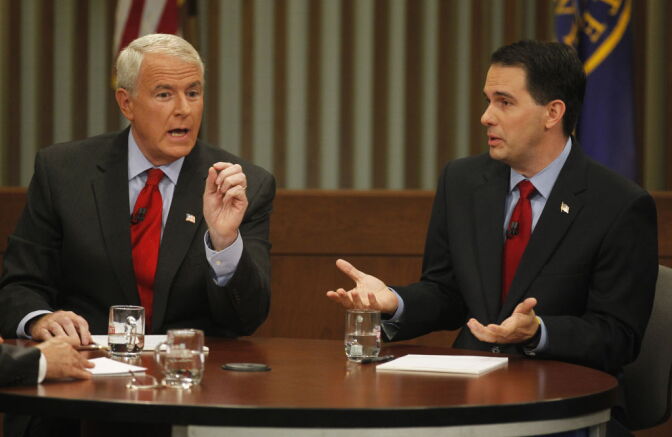 Republican Wisconsin Gov. Scott Walker, right, and Democratic challenger Tom Barrett participate in a televised debate Thursday, May 31, 2012, in Milwaukee.