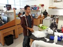 Brian Tom, 17, a Bravo Medical Magnet High School student, works in the stem cell research lab of USC's Keck School of Medicine, one of several young people gaining lab exerience this summer.
