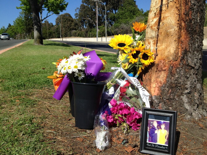 A makeshift memorial at the site where five teenagers were killed in a solo car wreck on Jamboree Road in Newport Beach.