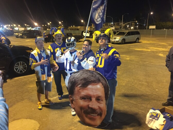 Rams fans rally at the Hollywood Park Casino in Inglewood Tuesday night, where revelers were decked out in blue and gold Rams jerseys and T-shirts.