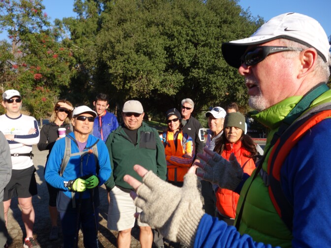 Hiker Mikey Lynch addresses friends in advance of a Black Friday hike in honor of the hike's originator, Phil Kent, who died two months before.