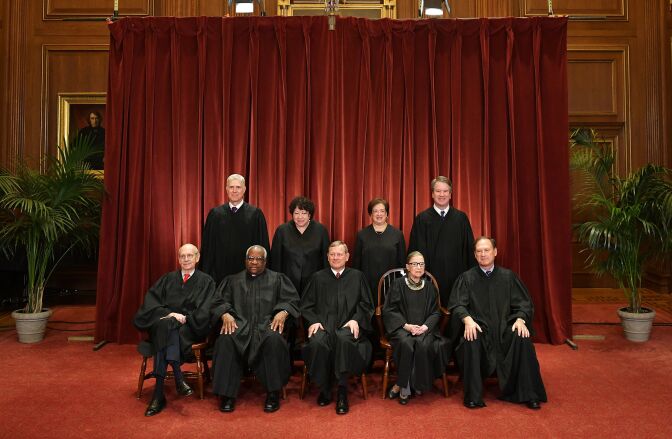 Justices of the US Supreme Court pose for their official photo at the Supreme Court in Washington, DC on November 30, 2018. - Seated from left: Associate Justices Stephen Breyer, Clarence Thomas, Chief Justice John  Roberts, Ruth Bader Ginsburg and Samuel Alito. Standing from left: Associate Justices Neil Gorsuch, Sonia Sotomayor, Elena Kagan and Brett Kavanaugh (Photo by MANDEL NGAN / AFP)        (Photo credit should read MANDEL NGAN/AFP/Getty Images)