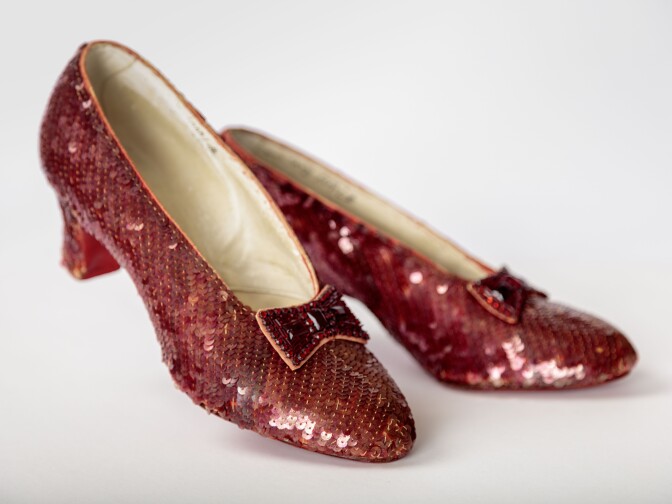 Screen-used close-up pair of the Ruby Slippers, designed by Adrian, from "The Wizard of Oz." These are part of the collection of the Academy Museum of Motion Pictures.