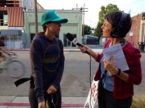 KPCC's political reporter Sharon McNary interviews Venice resident Jena Goodman Wednesday, November 15. 