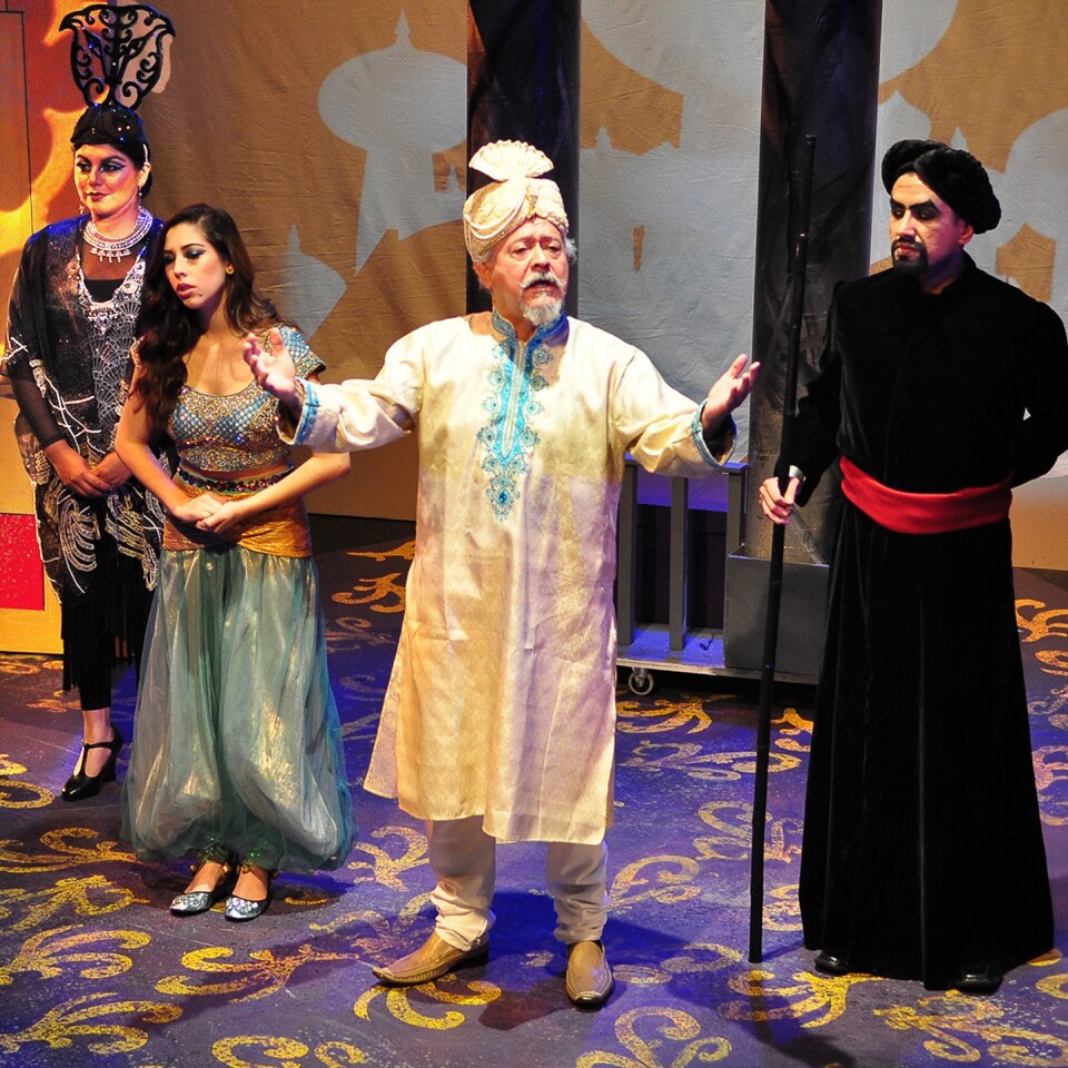 Rosa Navarrete as Rajah, Sarah Kennedy as Princess Jasmín, Henry Madrid as the Sultan, and Luis Marquez as Jafar in "Aladdin, Dual Language Edition" playing at Casa 0101 theater.