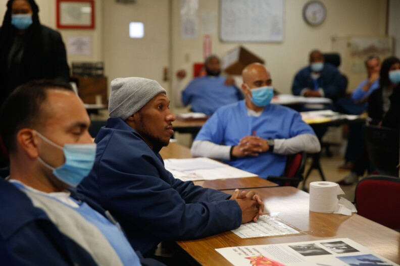 Incarcerated students in a Pitzer College classroom in prison.