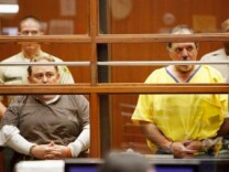 Former City of Bell, California Manager Robert Rizzo (L) and former City of Bell, California council member Victor Bello (R) appear in court with six other current and former City of Bell officials at Los Angeles County Criminal Courts September 22, 2010.