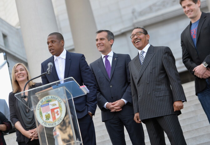 LOS ANGELES, CA - APRIL 16:  (L-R) United Way President & CEO Elise Buik, recording artist Jay Z, Los Angeles Mayor Eric Garcetti, Council President Herb Wesson and Budsweiser Vice President Brian Perkins speak onstage at Budweiser Made In America Press Conference at Los Angeles City Hall on April 16, 2014 in Los Angeles, California.  (Photo by Michael Buckner/Getty Images  for Budweiser)