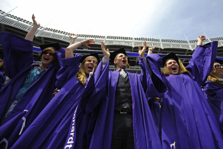 New York University (NYU) students cheer after receiving their degrees during  NYU's 177th Commencement at the Yankee Stadium in New York, May 13, 2009. US Secretary of State Hillary Clinton received an honorary degree from NYU, during the graduation ceremony  which awarded some 6,000 students their degrees. AFP PHOTO/Emmanuel Dunand (Photo credit should read EMMANUEL DUNAND/AFP/Getty Images)