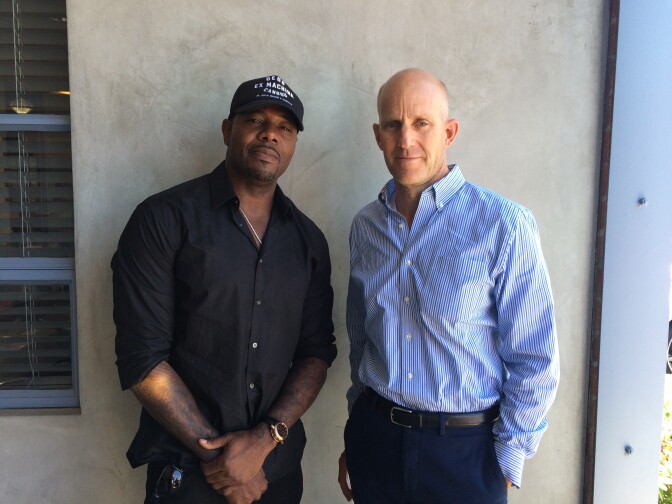 Director Antoine Fuqua and The Frame host John Horn pose together after their interview at NPR West. 