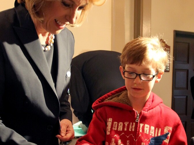 Los Angeles City Controller Wendy Greuel votes with her son Thomas by her side in the Los Angeles mayoral primary on March 5, 2013 in Los Angeles.