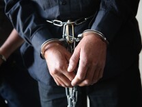 ADELANTO, CA - NOVEMBER 15: Immigrants prepare to be unshackled and set free from the Adelanto Detention Facility on November 15, 2013 in Adelanto, California. The center, the largest and newest Immigration and Customs Enforcement (ICE), detention facility in California, houses an average of 1,100 immigrants in custody pending a decision in their immigration cases or awaiting deportation. The facility is managed by the private GEO Group. ICE detains an average of 33,000 undocumented immigrants in more than 400 facilities nationwide. (Photo by John Moore/Getty Images)