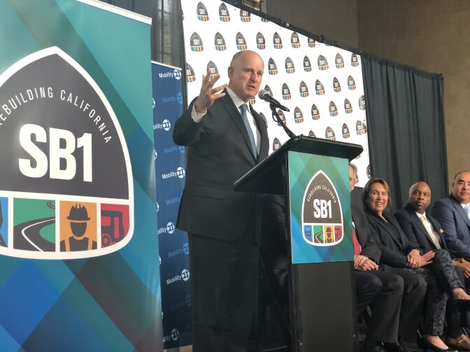 Gov. Jerry Brown addresses state and local transportation officials gathered at the Mobility 21 conference on May 18, 2018. The meeting was billed as one focusing on California’s crumbling transportation infrastructure.