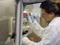 TO GO WITH AFP STORY by Justine Gerardy ===  A medical technician works at the South African Tuberculosis Vaccine Initiative (SATVI) at Brewelskloof Hospital, on January 27, 2011, in Worcester, South Africa. The infant is one of 2,784 volunteers in a two-year-trial in South Africa's winelands that scientists hope will lead to a new jab against the lung disease that kills one person every 20 seconds worldwide. South Africa is a prolific testing ground with the world's second heaviest rate of TB after Swaziland, according to SATVI, and preys on weakened immune systems due to high HIV levels which affects 5.7 million of the 48 million population. AFP PHOTO/RODGER BOSCH (Photo credit should read RODGER BOSCH/AFP/Getty Images)