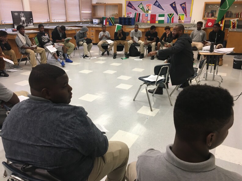 Locke High School math teacher Eric Strong leads the group of students in the "See A Man, Be A Man" program. "SAMBAM," for short, is a program designed to connect young African-American students with role models and mentors.