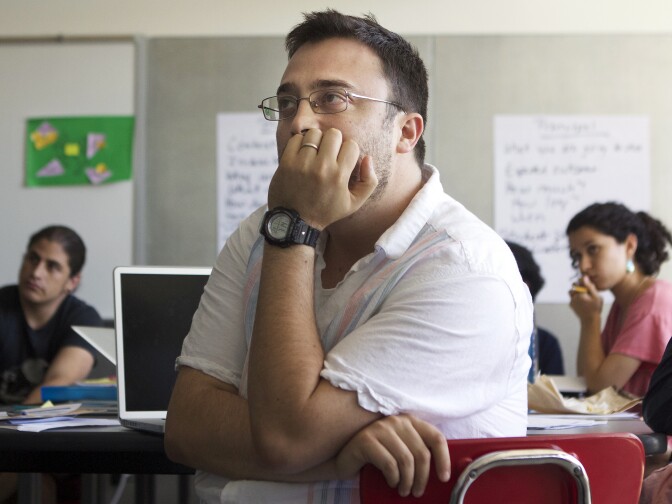 Diego Robles looks on during a lesson at Cortines high school. Robles is one of 12 students participating in a new teaching artist training program through CalArts.