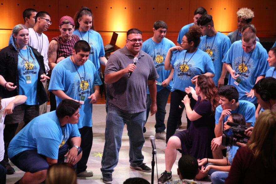 Luis Castillo, center, participated in the Segerstrom Center's Summer at the Center program for at-risk youth in one of its first years. He'll sing on-stage during the 25th anniversary performance on Saturday, July 30.