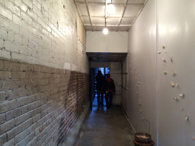 A scene from the anonymous art collective's installation, "Petal Drop LA."