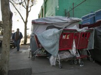 File: A tent stands on E Sixth Street at Gladys Avenue in Skid Row on Thursday morning, Dec. 17, 2015. 