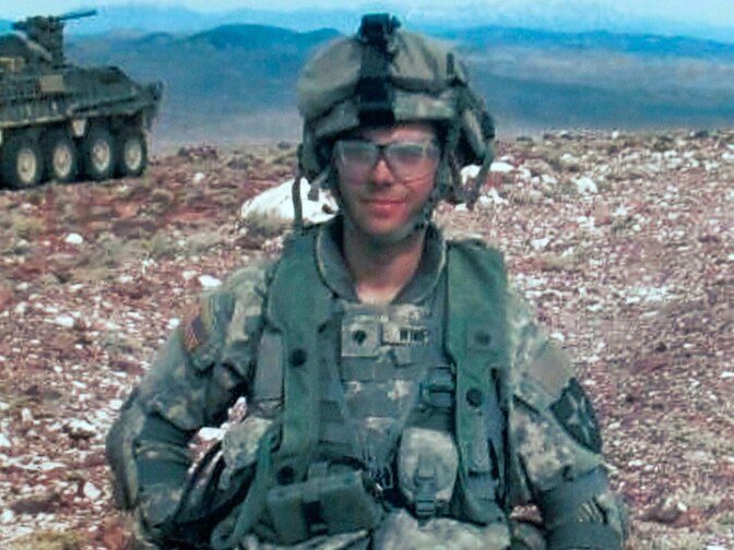 This undated photo released by the Winfield family shows U.S. Army Spc. Adam Winfield on duty in Afghanistan. Winfield is one of five American soldiers accused of murdering civilians in three separate incidents earlier this year.