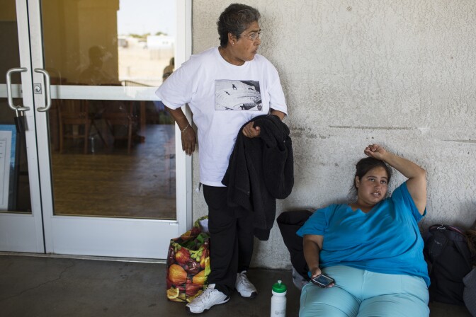 Women wait in line to get a bed for the night at Grace Resource Center's Lancaster Community Homeless Shelter on Tuesday afternoon, May 31, 2016. The shelter receives funding from the Los Angeles Homeless Services Authority for 25 beds for men and 25 for women.