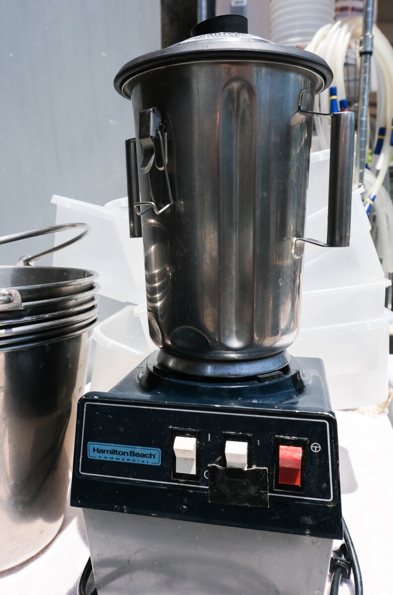 A silver industrial blender.