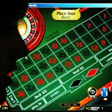 LONDON - JULY 27:  A woman looks at the a casino websites on July 27, 2004 in London. Internet gambling websites should introduce age-verification checks to prevent children from betting online, NCH, a children's charity, urged on Tuesday. The call by the charity NCH came after it found that a 16-year-old girl was able to register with 30 gambling sites after lying about her age.  (Photo iillustration by Graeme Robertson/Getty Images).