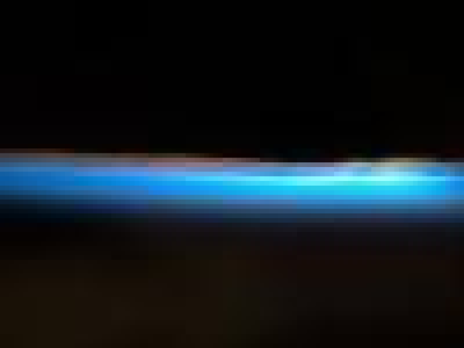 The thin line of Earth's atmosphere and the setting sun are featured in this image photographed by an STS-128 crew member on the Earth-orbiting space shuttle Discovery. 
