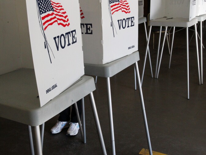 A voter casts their ballot at a polling station in the Summit Christian Fellowship in Big Bear, California, November 8, 2016. / AFP / Bill Wechter        (Photo credit should read BILL WECHTER/AFP/Getty Images)