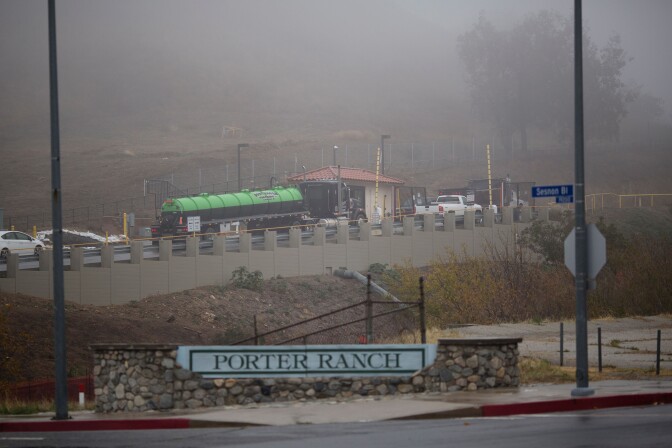 File: Trucks enter the gates of Southern California Gas Company property where Aliso Canyon Storage Field is located as people continue to be affected by a massive natural-gas leak in the Porter Ranch neighborhood of the of the San Fernando Valley region of Los Angeles on Dec. 22, 2015.