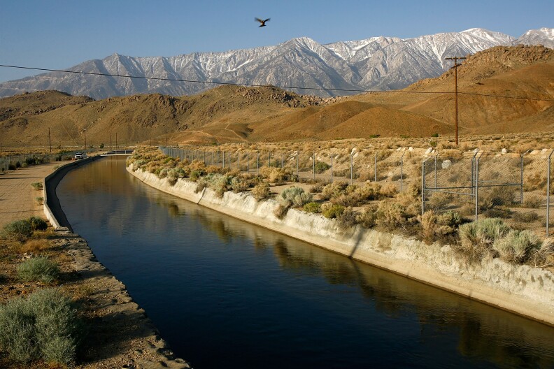 LONE PINE, CA - MAY 09:  The Los Angeles Aqueduct carries water from the snowcapped Sierra Nevada Mountains, which carry less snow than normal, to major urban areas of southern California on May 9, 2008 near Lone Pine, California. Urgent calls for California residents to conserve water have grown in the wake of the final Sierras snow survey of the season indicating a snow depth and water content at only 67 percent of normal levels. The Sierra snowpack is vital to California water supplies and officials are preparing plans for mandatory water conservation. In Southern California, the Metropolitan Water District, cut deliveries to farmers by nearly a third and growers in Fresno and Kings counties have not planted about 200,000 acres of crops, a third of the land irrigated by Westlands Water District. Many farmers are now selling their government-subsidized water for profit instead of using it to plant crops. Much of the California water supply comes from the Colorado River where a continuing eight-year drought has lowered water storage to roughly half of capacity. Dry conditions across the West have already doubled the wildfires this year causing fire officials to brace for a possible repeat of the devastating 2007 southern California wildfire season.  (Photo by David McNew/Getty Images)