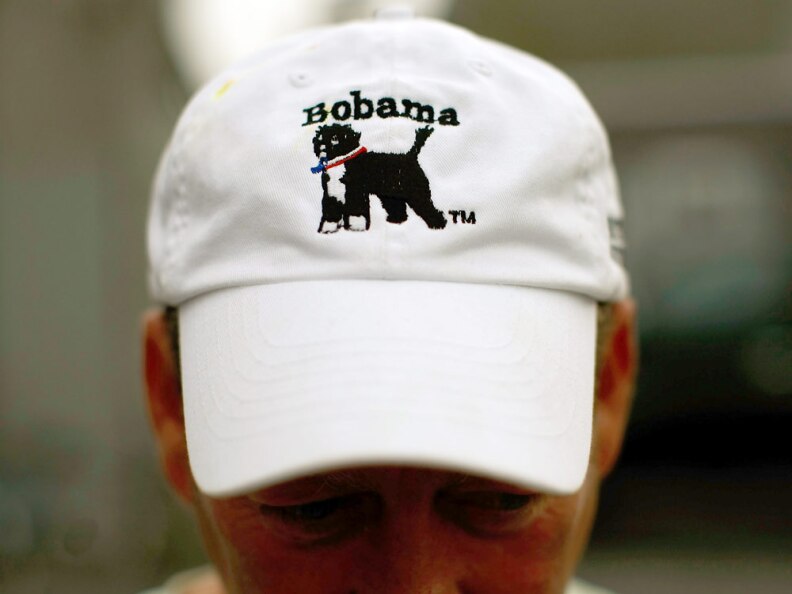 John Farrington shows off a hat he designed featuring President Obama's dog, Bo, on Aug. 6 in Edgartown, Mass., on the island of Martha's Vineyard.