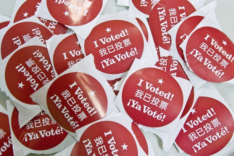SAN FRANCISCO - FEBRUARY 5:   Stickers that say "I Voted" in English, Spanish and Chinese are seen at a polling place February 5, 2008 in San Francisco, California. Voters in 24 states head to the polls today in the U.S. presidential election's biggest primary day, Super Tuesday.  (Photo by David Paul Morris/Getty Images) 