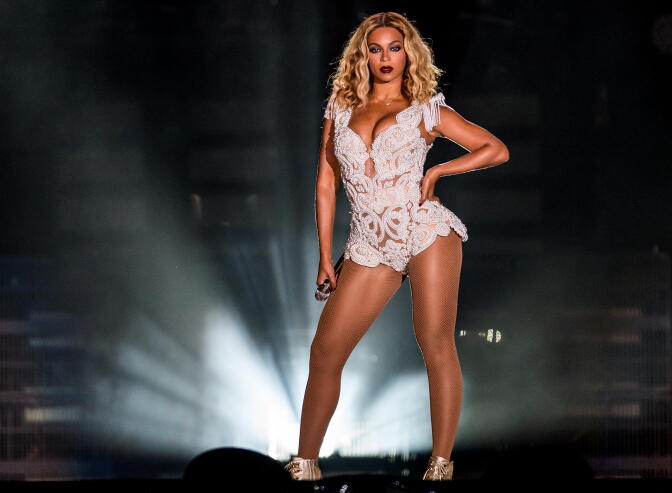 Singer Beyonce performs on stage during a concert in the Rock in Rio Festival on September 13, 2013 in Rio de Janeiro, Brazil. 