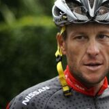 Lance Armstrong arrives at a training session during a rest day of the 2010 Tour de France.