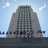 The L.A. city budget includes increases in parking fines and the elimination of funds that allow Angelenos to remotely testify before the L.A. City Council. 