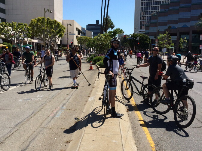 Bicyclists and skate boarders enjoy car-free access to a six-mile stretch of Wilshire Boulevard at CicLAvia.