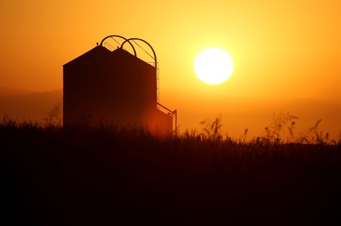 FIREBAUGH, CA - AUGUST 22:  The sun rises over a farm on August 22, 2014 near Firebaugh, California. As the severe California drought continues for a third straight year, Central California farming communites are struggling to survive with an unemployment rate nearing 40 percent in the towns of Mendota and Firebaugh. With limited supplies of water available to water crops, farmers are leaving acres of farmland unplanted and are having to lay off or reduce the hours of laborers.  (Photo by Justin Sullivan/Getty Images)