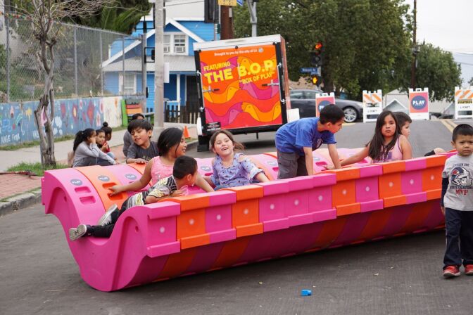 Children play at a Pop up play streets event.