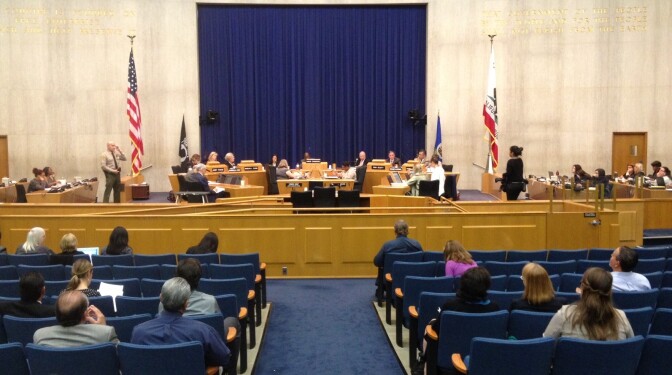 The blue ribbon commission votes on the language of a final report that took a critical look at L.A. County's foster care system on April 10, 2014. It is set to be presented to the L.A. County Board of Supervisors later this month.