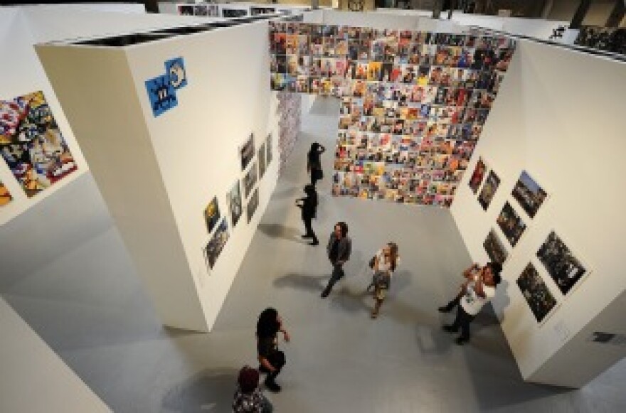 A work (upper left hand corner) by French street artist Space Invader is on display at the 'Art In The Streets' exhibtion inside the Museum of Contemporary Art (MOCA) in Los Angeles on April 21, 2011.