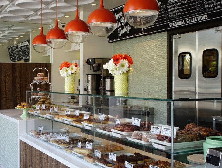 Simple, classic decor style marks the interior at Kettle Glazed Doughnuts in Hollywood, the highlight of which is this display case showcasing the day's sweet treats.