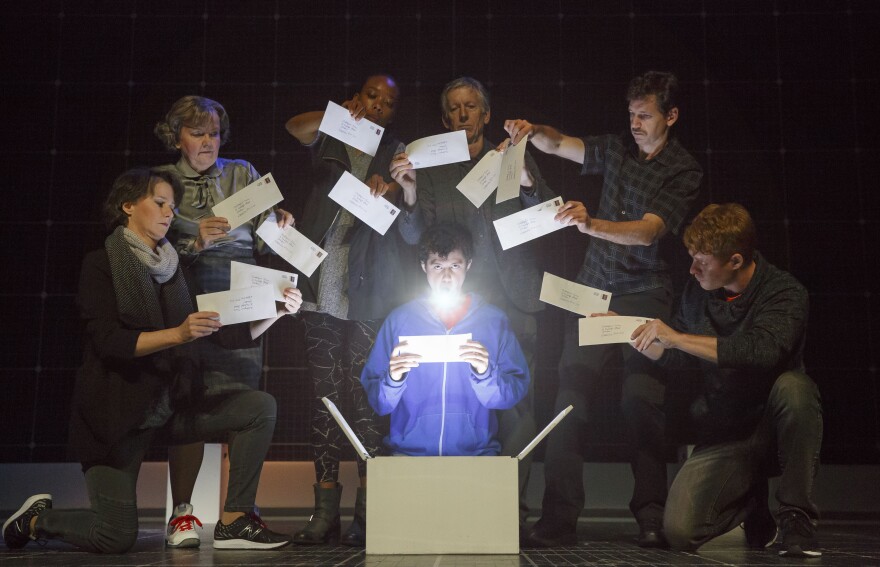 Adam Langdon as Christopher Boone (center) with the cast of the touring production of “The Curious Incident of the Dog in the Night-Time,” which will be presented by Center Theatre Group at the Ahmanson Theatre August 2 through September 10, 2017. For tickets and information, please visit CenterTheatreGroup.org or call (213) 972-4400. Media Contact: CTGMedia@CTGLA.org / (213) 972-7376. Photo by Joan Marcus.