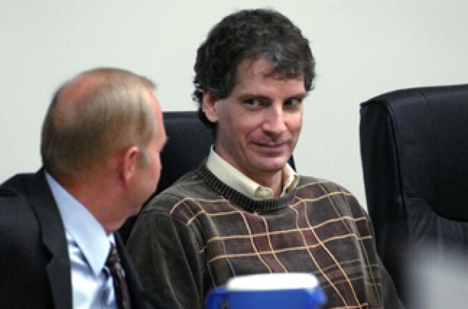 File photo: Joseph Edward Duncan III (R), listens to his Public Defender John Adams (L), during a plea agreement and sentencing hearing in the court room of the Kootenai County Jail 16 October, 2006 in Coeur d' Alene, Idaho.