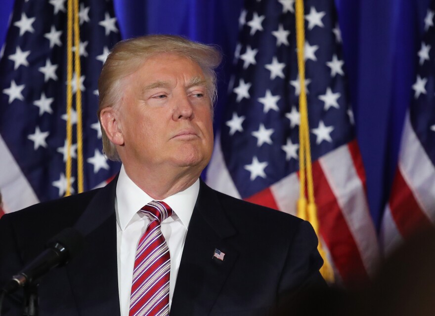 File: U.S. Republican Presidential candidate Donald Trump addresses supporters and the media following primary elections on June 7, 2016 in Briarcliff Manor, New York. 